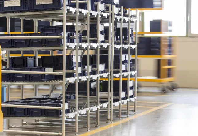 Material shuttles and transport racks