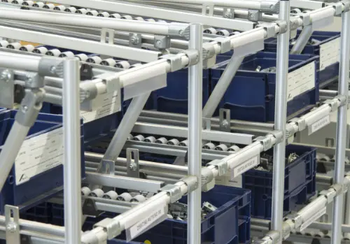 Material shuttles and transport racks